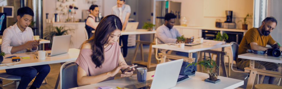 People working in a corporate office space