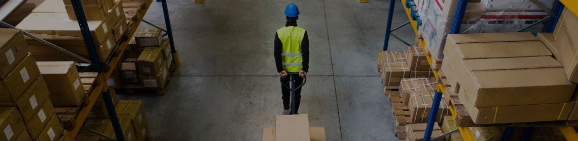 Worker pulling the trolley